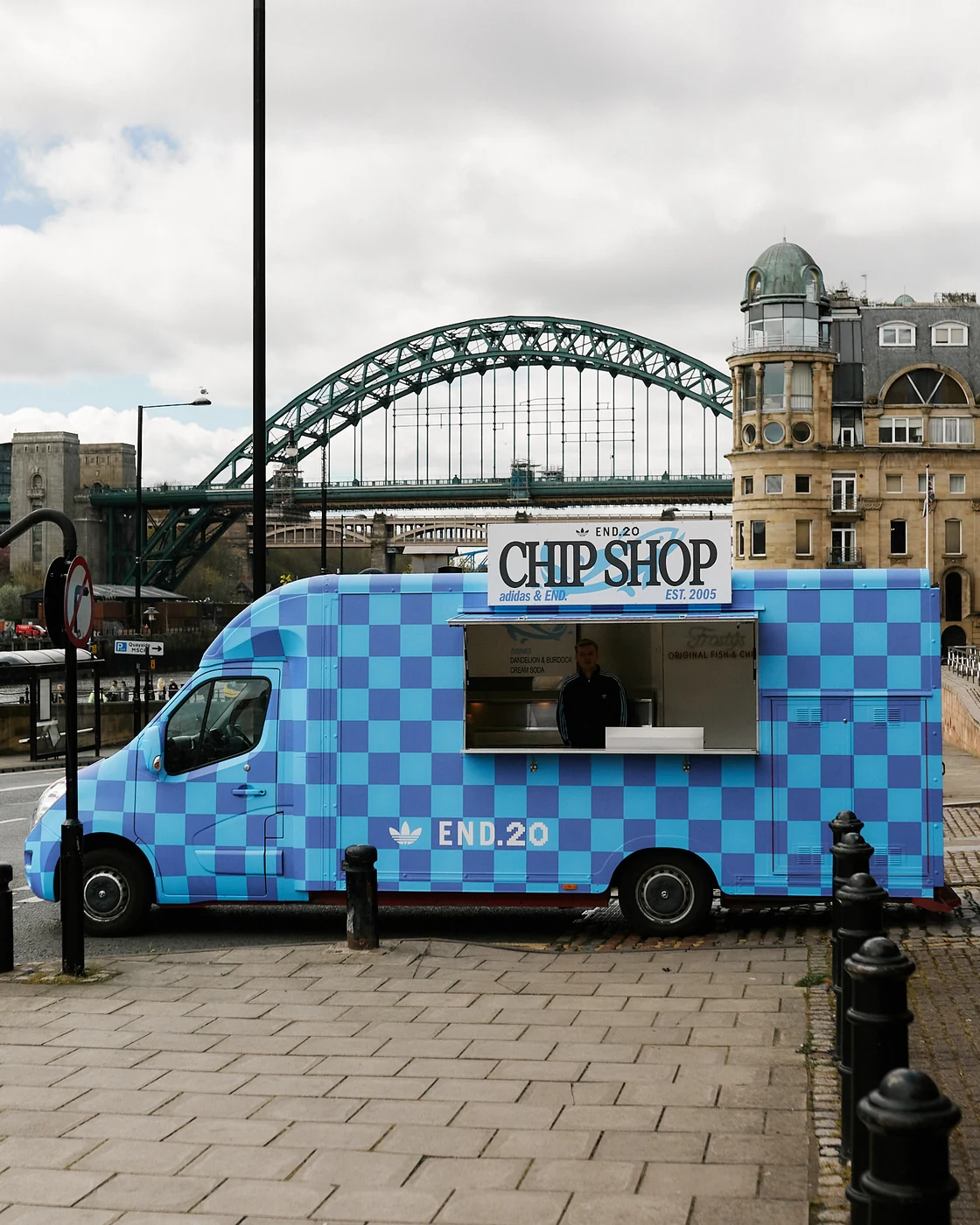 Blue checked END. Chip Shop truck with the Tyne Bridge behind